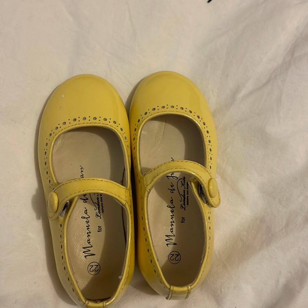 Adorable little girls light yellow shoe
